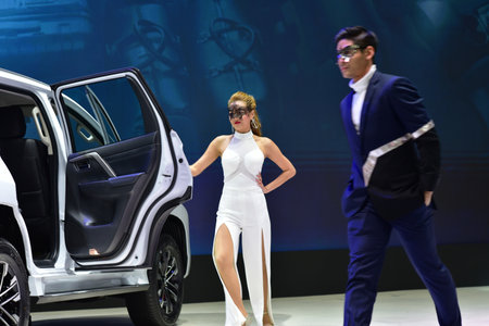 Bangkok Thailand August 24 2019 blur Unidentified Pretty is presenting a car for sale at the Bangkok Motor Showのeditorial素材
