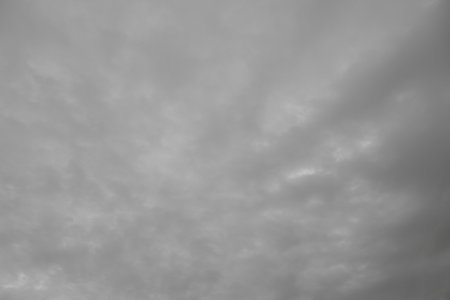Black sky and white clouds for background.after rainingの写真素材