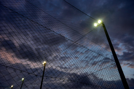 Black sky with football field net backgroundの写真素材