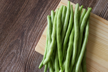 Close up of a pile of green string beansの写真素材