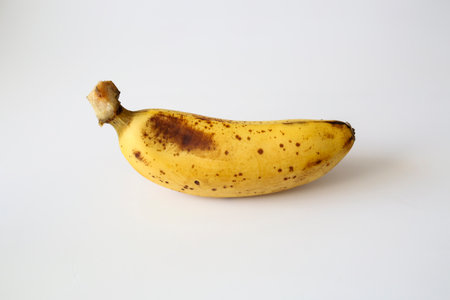 Yellow banana isolated on a white backgroundの写真素材