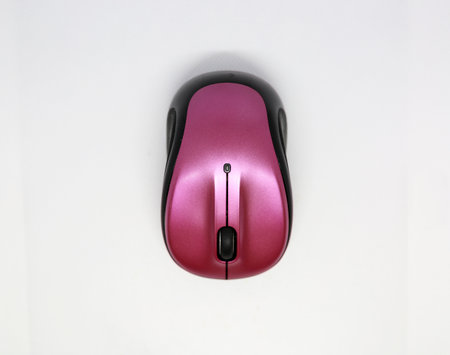 Pink and black mouse isolated on a white background