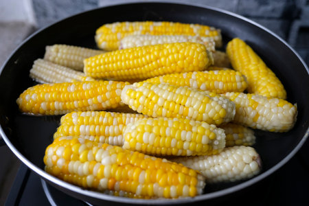 Steam corn inside a pot.の写真素材