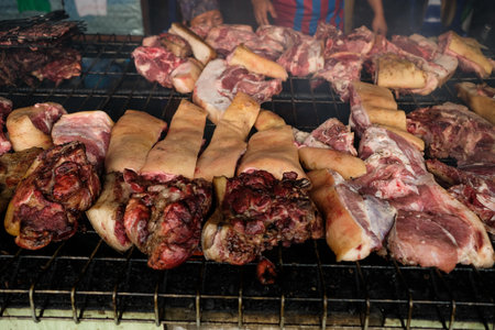Tuaran, Sabah, Malaysia, Oct 31, 2021: Smoked wild boar, a Sabah Borneo delicacy sold at the roadside along the way to Mount Kinabalu National park.のeditorial素材