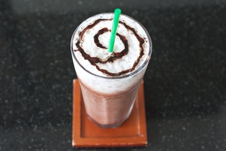 Ice chocolate on black marble table の写真素材