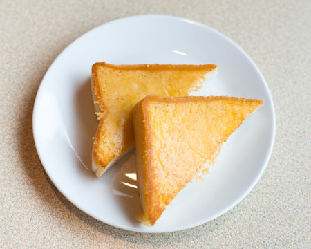 A crusty toasted bread with cheeseの写真素材