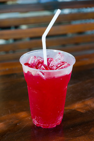 fresh, ice cold water in Plastic cup の写真素材
