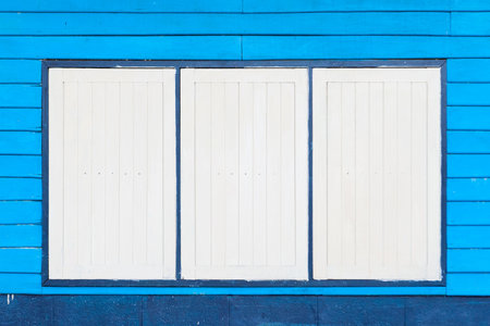 window with blue wall. の写真素材