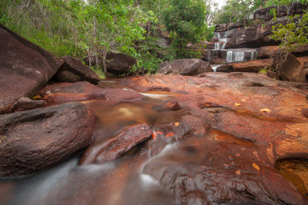 Water fall at Chanadai hill in Pha Taem National Park ,Chanadai hill is famous for seeing sunrise first time in thailand.の写真素材