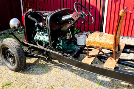 A car with no chassis and only the vital parts left to drive itの写真素材