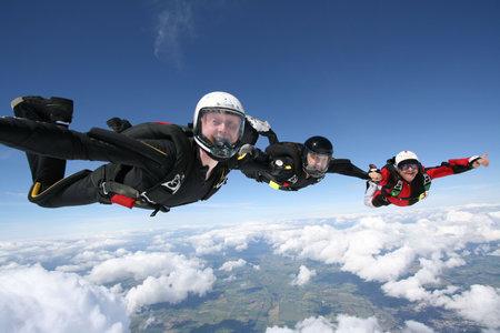 Skydivers form a lineの写真素材