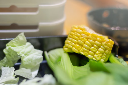 Fresh vegetables are placed in the food tray.の写真素材