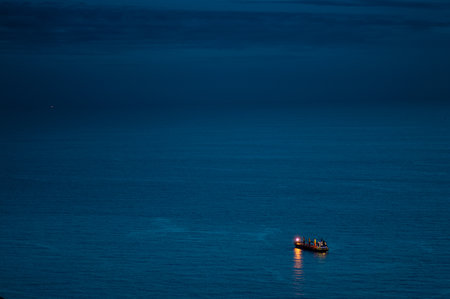 A sailing ship through the blue oceanの写真素材