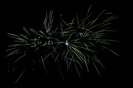 Green fireworks at nightの写真素材