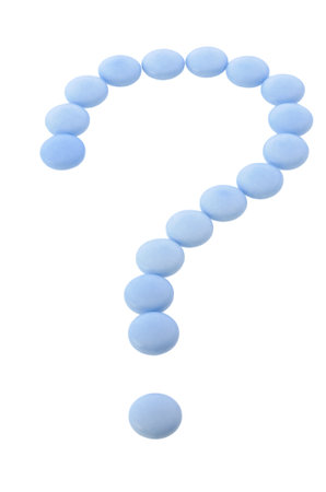 Question mark from blue pills isolated on whiteの写真素材