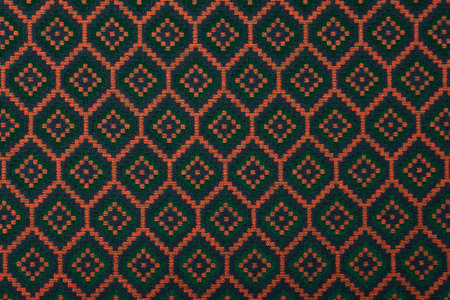 Material in geometric patterns, a colored textile background の写真素材