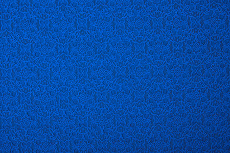 Blue fabric with flowers, a textile background の写真素材