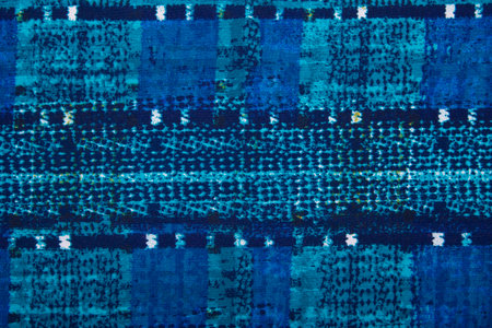 The blue material in an abstract patterns, a background