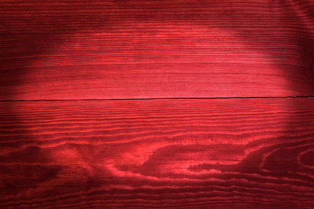 The old red boards with vignette, a wooden background の写真素材