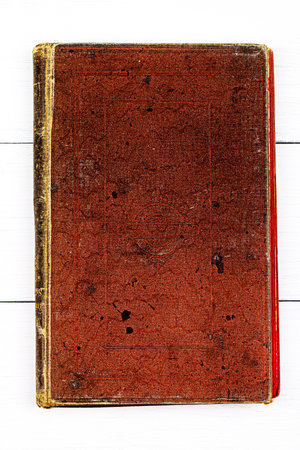 Old book on a white boardsの写真素材