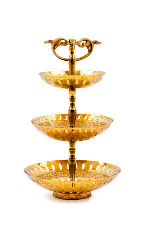 Old golden dishの写真素材