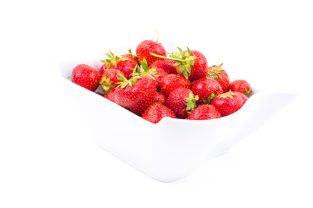 Fresh strawberries in porcelain bowlの写真素材
