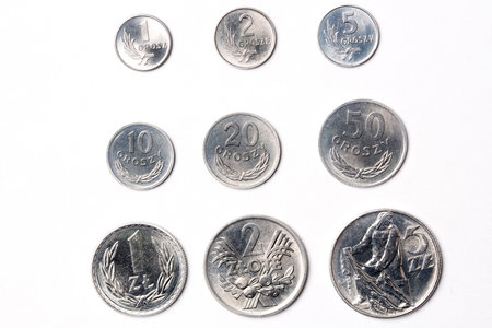 Old Polish coins on a white backgroundの写真素材