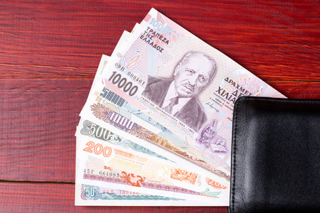 Greek money in the black walletの写真素材