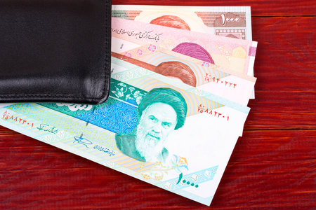 Money from Iran in the black walletの写真素材