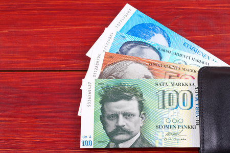 Money from Finland in the black walletの写真素材