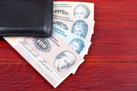 Old money from Denmark in the black walletの写真素材