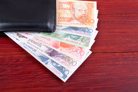 Money from Spain in the black walletの写真素材