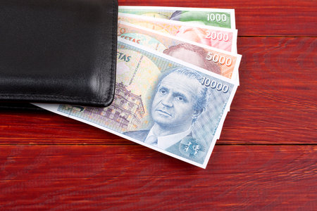 Money from Spain in the black walletの写真素材