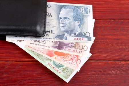 Money from Spain in the black walletの写真素材