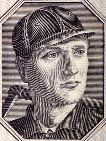 Portrait of a miner from old Polish moneyの写真素材
