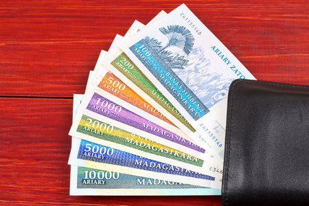 Malagasy Ariary in the black walletの写真素材