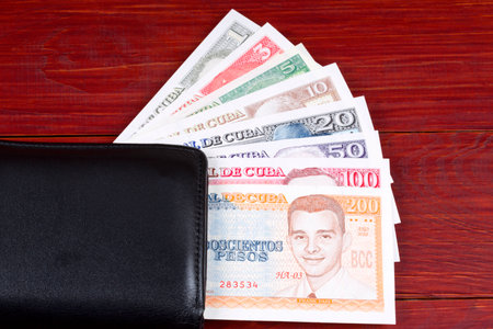 Cuban money in the black walletの写真素材
