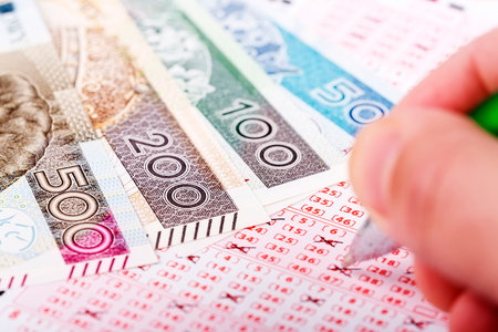 Lottery ticket with a pen and Polish moneyの写真素材