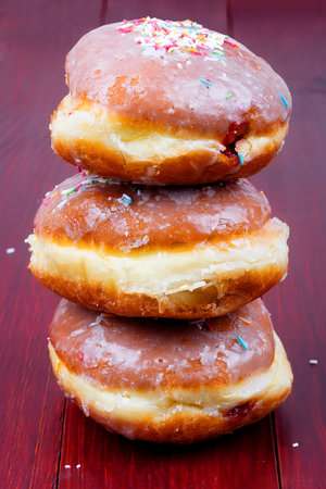 Donuts on a wooden backgroundの写真素材