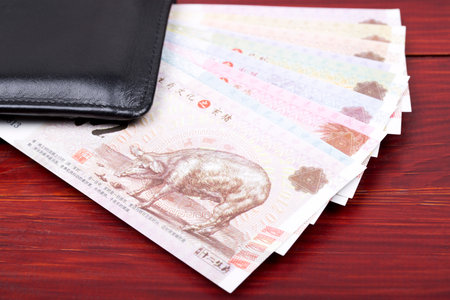 Chinese money in the black walletの写真素材