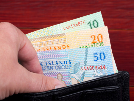 Cook Islands dollar in the black walletの写真素材