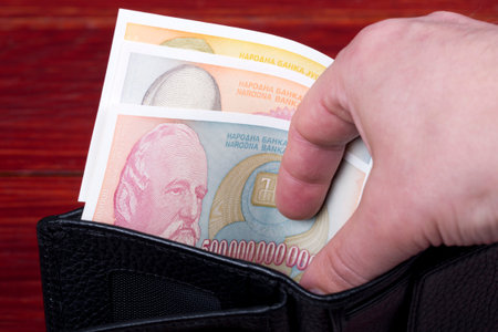 Old Yugoslav money - dinar in the black wallet
