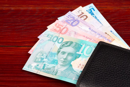 Scottish money - Pounds in the black wallet