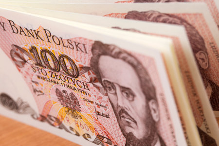 Old Polish money - 100 Zloty a business background