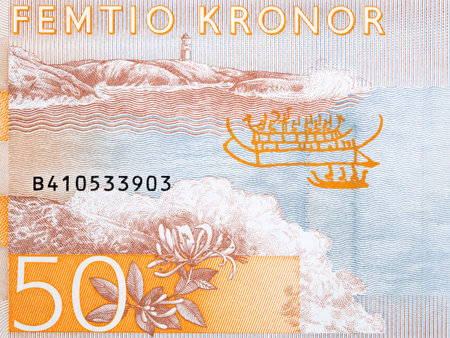 Lighthouse on coastline from Swedish money - Crown
