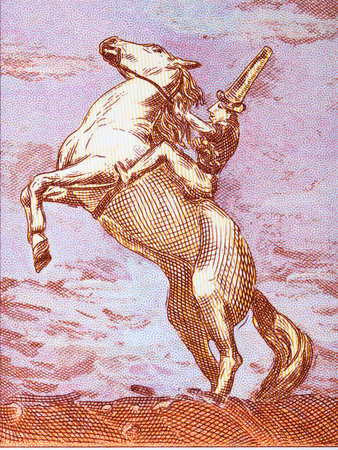Fragment of Cyprian Majernik's painting - Horseman on the seashore from moneyの写真素材