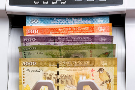Sri Lankan money - rupee in the counting machine