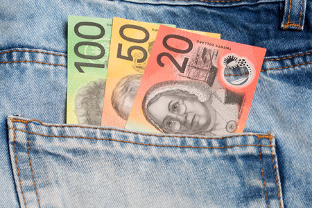 Australian money - dollar in the pocket of blue jeansの写真素材