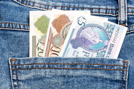 Northern Irish money - pound in the pocket of blue jeans