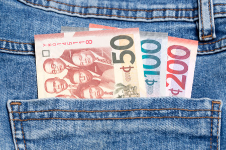 Ghanaian money - Cedi in the pocket of blue jeans